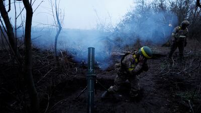 Ukrainian mortar crews fire on Russian lines in Donetsk. Reuters
