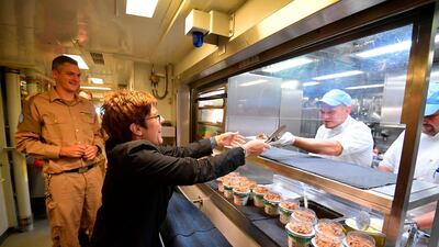 German Defence Minister Annegret Kramp-Karrenbauer gets a meal on board of a military corvette during her two-day-visit of the German soldiers of the United Nations Interim Force in Lebanon (UNIFIL) as they leave the Port of Limassol, Cyprus. AFP