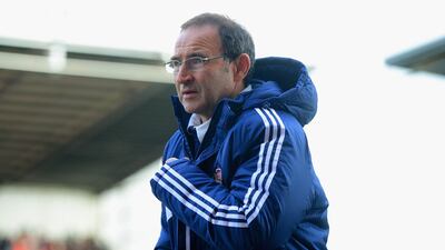 Sunderland manager Martin O'Neill feels the cold on the touchline between Stoke City and Sunderland. Michael Regan/Getty Images