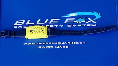 The plastic bracelet sends distress signals to a receiver at the side of the pool if a wearer is under water for too long. Satish Kumar / The National