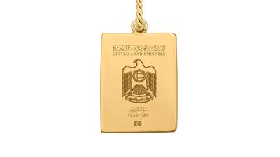 A gold Emirati passport pendant, by Emirati label MKS. Courtesy MKS