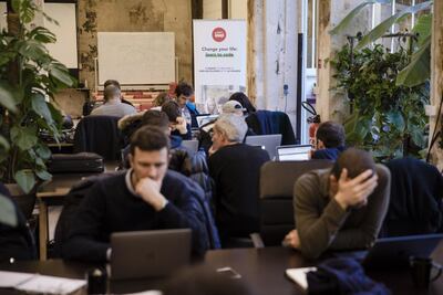 Students work at their laptops at Le Wagon coding boot camp in Paris. Marlene Awaad / Bloomberg