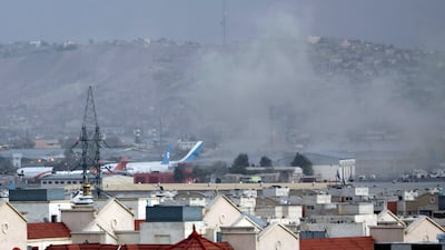 Smoke rises from a deadly explosion outside the airport in Kabul, Afghanistan. AP