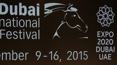 Catherine Deneuve receives a lifetime achievement award from Sheikh Mansoor bin Mohammed at the Dubai International Film Festival. Karim Sahib / AFP Photo