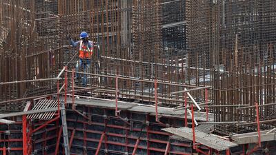 A man works on a construction site of a residential building in Mumbai, India, October 31, 2016. REUTERS/Shailesh Andrade - S1BEUKDQFHAA