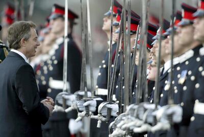 CAMBERLEY, ENGLAND - APRIL 11: British Prime Minister Tony Blair inspects Officer cadets after they completed their training at the Royal Military Academy Sandhurst April 11, 2003 in Camberley. Some 409 cadets took part in the event and it is the first time ever a serving Labour Prime Minister took the inspection and salute. (Photo by Julian Herbert/Getty Images)