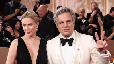 Mark Ruffalo and his wife, actress Sunrise Coigney, on the Golden Globes red carpet. AFP
