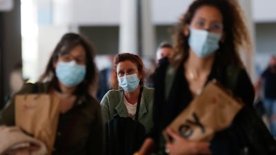 People arrive at Faro Airport from Manchester on the first day that Britons are allowed to enter Portugal without needing to quarantine. Reuters