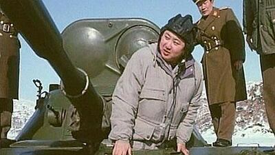 Kim Jong-un, the new leader of North Korea, inspects a tank in this still image from a released documentary of the 'Supreme Leader' by North Korea's state television station.
