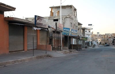 A deserted street in the Syrian district of Deraa Al Balad following fighting between government forces and armed opposition groups on August 16, 2021. AFP