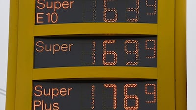 The prices of petrol are displayed on a sign at a service station in Dortmund, western Germany. Oil rebounded close to multi-year peaks after the IEA lifted global demand forecasts -- and cited shortages of natural gas and coal that are sparking a switch to crude. AFP