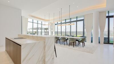 A spacious formal dining area. Courtesy Luxhabitat Sotheby's International Realty