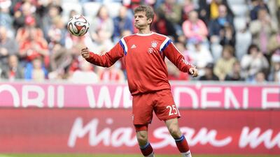 Bayern Munich's Thomas Muller warms up before his side's Bundesliga victory over Eintracht Frankfurt on Saturday. Christof Stache / AFP / April 11, 2015