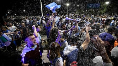 Supporters await the arrival of the World Cup-winning Argentina squad at the Football Association headquarters. AFP