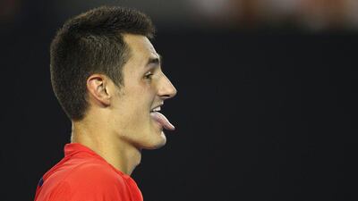Bernard Tomic of Australia reacts in his fourth round match against Andy Murray of Great Britain during day eight of the 2016 Australian Open at Melbourne Park on January 25, 2016 in Melbourne, Australia. (Photo by Mark Kolbe/Getty Images)