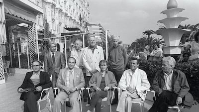 The 1984 Cannes International Film Festival jury: (front row L-R), Italian composer Ennio Morricone, Stanley Donen, Isabelle Huppert, Dirk Bogarde, Jorge Semprun; (back row L-R), Franco Cristaldi, Vadim Yusov, Arne Hestenes and Michel Deville. AFP