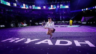 Elena Rybakina with the trophy after beating Aryna Sabalenka 6-3, 7-6. Reuters