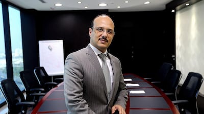 Hassan Elhais outlines categories. Satish Kumar / The National