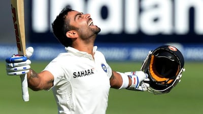 Virat Kohli of India celebrates his 100 runs during day 1 of the first Test match against South Africa at Bidvest Wanderers Stadium on Friday. Duif du Toit / Getty Images