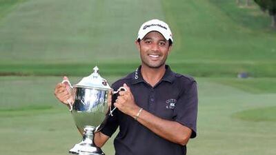 Arjun Atwal held off a cluster of challengers to win the Wyndham Championship in North Carolina on Sunday.