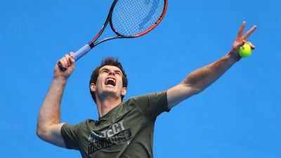 Andy Murray serves during a Friday practice session at Melbourne Park ahead of the Australian Open. Michael Dodge / Getty Images
