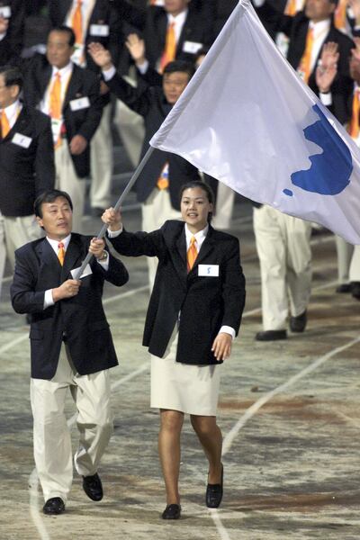 North Korea’s Jang Choo-pak and South Korea’s Chung Eun-soon at the 2000 Summer Olympic Games. Reuters