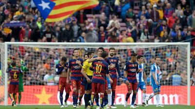 Barcelona players celebrate after their La Liga win on Sunday at the Camp Nou. Josep Lago / AFP / May 8, 2016