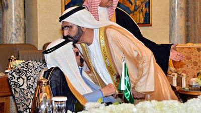 Sheikh Mohammed bin Rashid, Vice President of the UAE and Ruler of Dubai greets King Arabia Abdullah at an extraordinary GCC leaders summit in Riyadh on November 16, 2014. SPA / AFP Photo