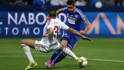 Pablo Hernandez, right, takes on Sharjah player Shaheen during the Arabian Gulf Cup final. Pawan Singh / The National