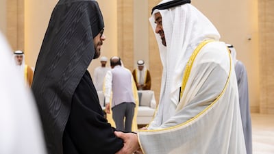 President Sheikh Mohamed greets a dignitary during the gathering.