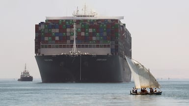 Container ship Ever Given on Great Bitter Lake near Ismailia Governorate in Egypt. Despite its best efforts to repair its economy and build revenue from assets like the Suez Canal, circumstances seem to deliver ever harder knocks to Cairo. EPA