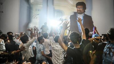 Fans react to his appearance on the screen. EPA