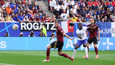 Randal Kolo Muani of France scores his team's opener, via an own goal by Belgium's Jan Vertonghen. Getty Images