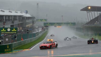The safety car leads the field at the attempted restart in Belgium. Getty