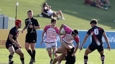 Players in action during the Gulf Under 19 boys cup semi-final 1 match between Dubai College (black) vs S22 UAE Academy.