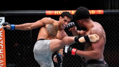 Carlos Ulberg of New Zealand kicks Kennedy Nzechukwu of Nigeria in their light heavyweight fight. USA TODAY Sports