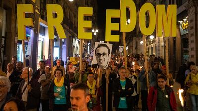 Catalan pro-independence protesters march during a demonstration in Barcelona, Spain. AP Photo