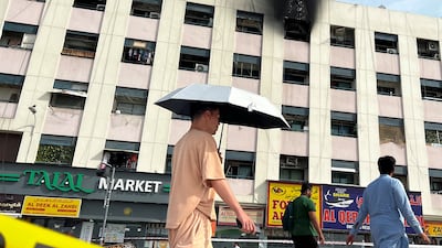 The residential building was devastated by the fire, which killed several people. Reuters