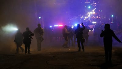Federal agents fire projectiles at demonstrators. Reuters