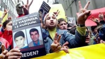 Kurdish children gather in Istanbul to protest against the killing by Turkish security forces of Ugur Kaymaz, 12, and his father Ahmet Kaymaz, 34.
