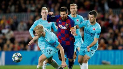 Barcelona's Lionel Messi finds it tough going in the Champions League draw against Slavia Prague at the Camp Nou. Reuters