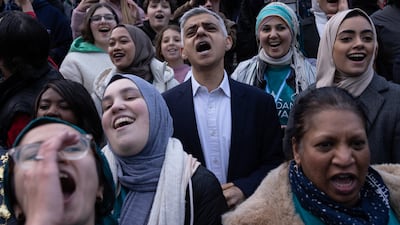 Muslims including London Mayor Sadiq Khan, centre, and members of other faiths gather in Trafalgar Square for an open iftar event on April 20. Mr Khan will stand for re-election next year. Getty