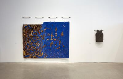 ‘Threat Value’ by Asif Mian evokes the splicing together of identities through the unification of two carpets. Bric