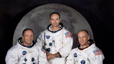 The Apollo 11 lunar landing mission crew with, from left, mission commander Neil A. Armstrong, command module pilot Michael Collins and lunar module pilot Edwin E. Aldrin Jr. pose in their space suits. NASA / EPA