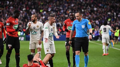 PSG midfielder Marco Verratti, centre, reacts during the match at Stade de France in Saint-Denis, outside Paris. Anne-Christine Poujoulat / AFP