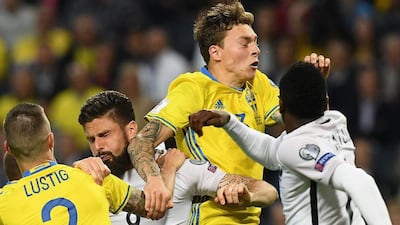 Sweden's Victor Lindelof clears the danger against France on June 9, 2017. / AFP