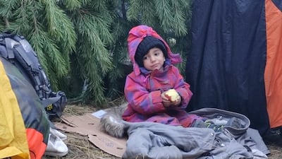 Arias, 2, and his family are struggling to contend with freezing temperatures in the woodlands of Belarus. Photo: Sanna Figlarowicz