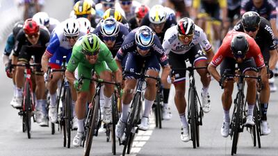 Deceuninck Quick-Step's Mark Cavendish claims victory.