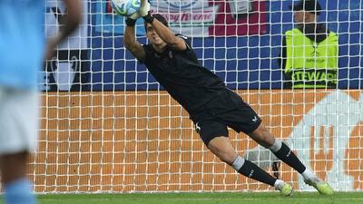 Sevilla's goalkeeper Bono makes a save. AP