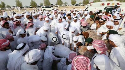 Emiratis bury Mohammed Hussein Ali Al Hosani, an Emirati soldier who was killed in Yemen’s eastern province of Marib, at Bani Yas cemetery in Abu Dhabi. AFP Photo